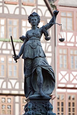 O tolo venda os olhos de Justitia. A primeira Justitia vendada não é virtude — é escárnio.